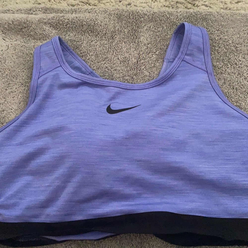 Never worn, no tags.  Nike women’s sports bra